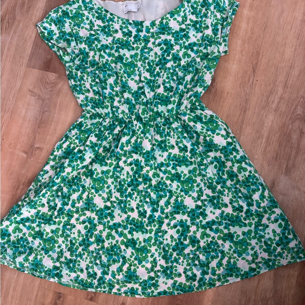Green, turquoise and white dress.